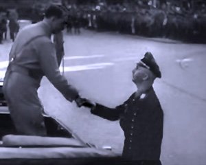 Adolf Hitler shaking hands with the dreaded Schutzstaffel (SS) leader Heinrich Himmler at a Berlin military parade in 1939.